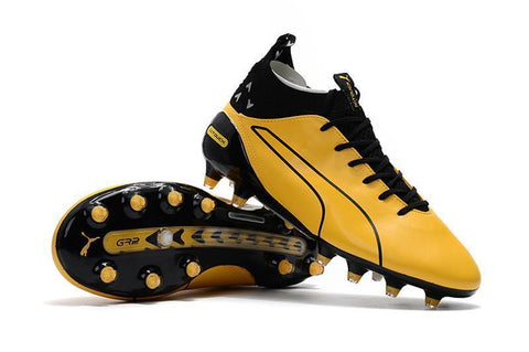 Image of PUMA evoTOUCH Pro FG Soccer Cleats Yellow Gold Black